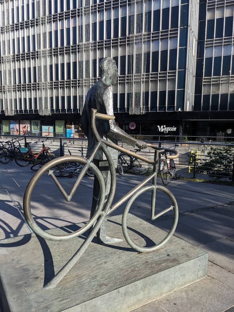 Aarhus,  Denmark,  sculpture of man with bike