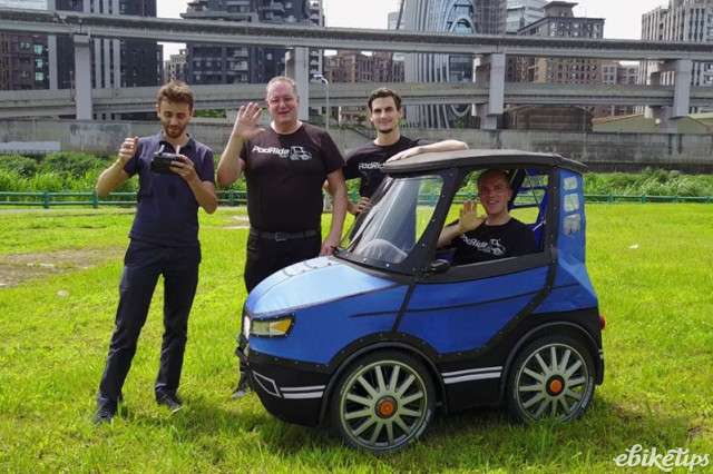 The Podride e-bike has four wheels and a roof to keep you dry